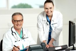 doctors-team-female-assistant-typing-on-keyboard